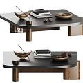 Minimalist Coffee Table With Dark Wood Top Books Pine Cones And Decorative Bowl