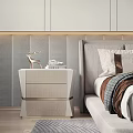 Modern Sleek Bedside Table With Deer Ornament Books And Upholstered Headboard Wall