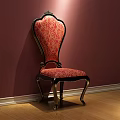 Ornate Red Patterned Dining Chair With Black Gold Frame Against Maroon Wall