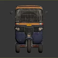 Vintage Blue Three Wheeled Tuk Tuk With Orange Canopy And Open Seating Design