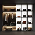 Various Stylish Bags And Boxes In Illuminated Display Cabinet With Shelves And Hanging Items
