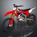 Red Dirt Bike Motorcycle On Display Stand With Black Wheels And White Accents