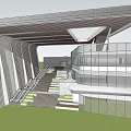 Contemporary Commercial Complex Featuring Glass Facades Metal Structures And Green Lawn