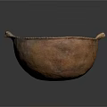 Handmade Brown Clay Bowl With Two Handles Displayed On Black Reflective Surface