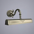 Vintage Metal Wall Sconce With Curved Arm And Ornate Carved Details