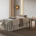 Relaxing SPA Room With Massage Bed Light Sheets Towels Candles And Ornate Wall