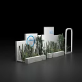 Indoor Plant Display With White Platforms Green Plants White Signs And Blue Circular Logo