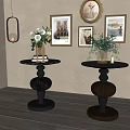Elegant Black and Brown Side Tables with Spherical Bases Round Tabletops and Green Plant Vases