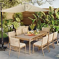 Outdoor Patio Dining Table And Chairs Set With Beige Umbrella And Green Plants