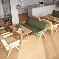 Modern Cafe Interior With Green Sofas Beige Chairs And Wooden Tables Design
