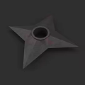 Star Shaped Shuriken Weapon With Central Hole And Sharp Metallic Edges