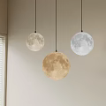 Moon Shaped Pendant Lights Hanging In Room With Different Colors And Window Blinds