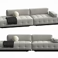 Gray Sectional Sofa with Tufted Square Design White Decor Ball and Dark Throw Blanket 3d model