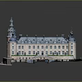 Historic Castle Architecture With Spired Towers Blue Roofs Stone Walls And Green Courtyard