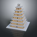 Traditional Block Built Tower With Multiple Floors Symmetrical Windows And Decorative Top