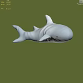 Cute Gray Plush Shark in Green Grass Field with Trees in the Distance