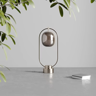Stylish Table Lamp With Metal Frame And Glass Globe On Gray Tabletop With Green Leaves 3d model