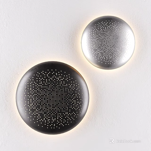 Modern Round Perforated Wall Lamps in Black and Silver with Warm Light Glow on White Wall 3d model 