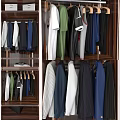 Wooden Wardrobe Interior With Hanging Shirts Jackets Pants And Organized Shelves