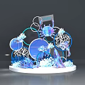 Ocean Themed Display With Crab Fish Coral Circular Elements And Blue Purple Decorations