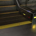 Modern Escalators And Staircase Design In Public Area With Marble Floor And Green Tiled Walls