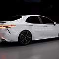 Sleek White Modern Sedan With Black Wheels And Red Interior Seats