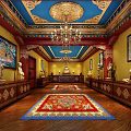 Traditional Religious Hall Interior Featuring Decorative Ceiling Chandelier Buddha Statues Murals And Floral Carpet