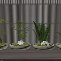 Bonsai Potted Plants in Round Stone Planters with Moss and Stones Against Wooden Lattice Background