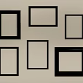 Golden Picture Frames With Various Styles Hanging On Beige Wall