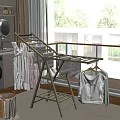 Modern Foldable Clothes Drying Rack With White Clothes On Balcony Home Use