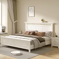 White Double Bed with Carved Headboard Soft Pillows Cozy Blanket and Nightstands in Bright Bedroom