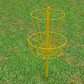 Yellow Disc Golf Basket Standing On Green Grass Field Outdoor Sports Equipment