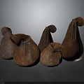 Brown Pear Shaped Textured Cloth Bags With Drawstring Closure In Various Sizes On Dark Background