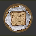 Traditional Matzah Stacked On Wooden Plate With White Lace Paper Liner