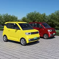 Yellow And Red Small Cars Parked On Brick Pavement With Green Trees Against Blue Sky