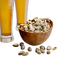 Cold Beer Glasses With Bottle And Pistachios For Happy Gathering Moments