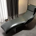 Sleek Modern Black Leather Chaise Lounge With Floor Lamp Curtains And Striped Wall