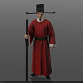 Man In Traditional Red Robe With Black Hat Holding Long Staff