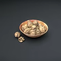 Whole Walnuts in Shell Served in Textured Wooden Bowl with Scattered Nuts on Dark Background