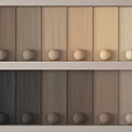 Wooden Floor Color Samples Showcasing Various Natural Tones And Round Wooden Knobs