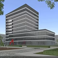 Modern High Rise Office Building With Glass Facade Landscaped Garden Water Feature And Red Sculpture