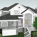 Detached Villa Two Story Gray Stone Walls Black Roof Balcony With White Railing And Garden