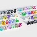Colorful Uppercase Letter Blocks Arranged In Different Directions On White Background