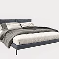 Modern Double Bed With Dark Upholstered Headboard White Gray Pillows And Soft Blanket