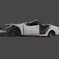 White Damaged Car With Severe Body Deformation Broken Glass And Rusted Parts