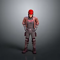 A Man in Red Helmet and Brown Gray Outfit Standing with Hands on Hips