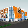 Modern Commercial Complex With Orange Blue Glass Facade Advertisement Billboards Parking Area And Greenery