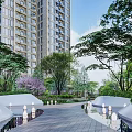 Urban Garden Landscape With High rise Buildings Lush Trees And Paved Walkway