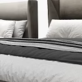 Modern Double Bed With Grey Headboard White Grey Bedding And Small Nightstands