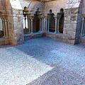 Cartoon Scenery of Medieval Castle Courtyard with Stone Arches Pillars and Cobblestone Floor